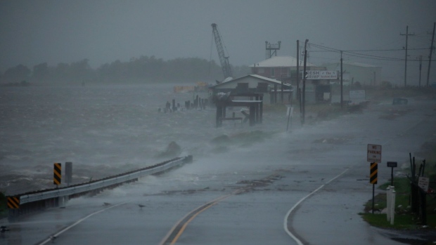 Storm surge begins to encroach on Louisiana Route 1 ahead of Hurricane Ida in Golden Meadow, Louisiana, U.S., on Sunday, Aug. 29, 2021. Hurricane Ida made its final push toward Louisiana Sunday, packing some of the strongest winds ever to hit the state and threatening to unleash widespread flooding and destruction in New Orleans.
