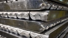 Stacks of aluminium ingots ahead of binding in the foundry at the Khakas aluminium smelter, operated by United Co. Rusal, in Sayanogorsk, Russia, on Wednesday, May 26, 2021. United Co. Rusal International PJSC’s parent said the company has produced aluminum with the lowest carbon footprint as the race for cleaner sources of the metal intensifies. Photographer: Andrey Rudakov/Bloomberg