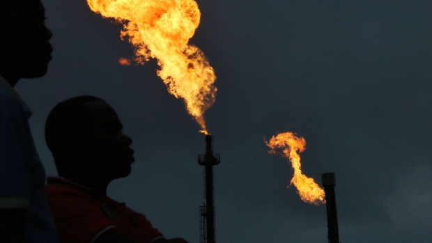 Gas flares burn from pipes at an oil flow station in Idu, Rivers State, Nigeria.