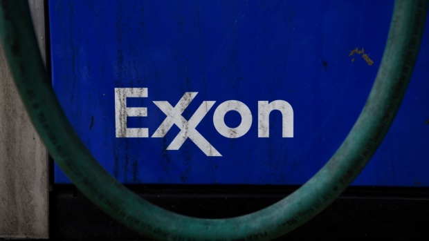 Signage at an Exxon Mobil Corp. gas station in Houston, Texas, U.S., on Wednesday, Oct. 28, 2020. Exxon is scheduled to release earnings figures on October 30. Photographer: Callaghan O'Hare/Bloomberg