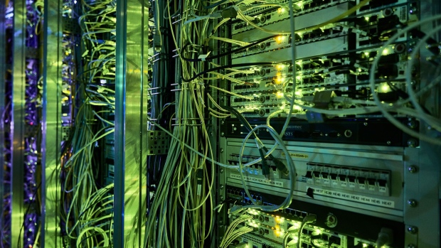 Green light illuminates server cables.