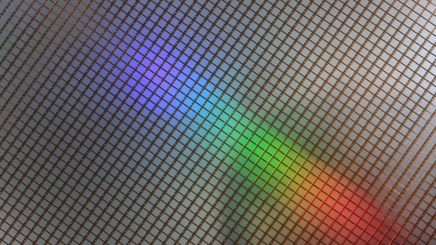 A 300mm silicon wafer at the semiconductor fabrication (fab) plant, operated by Robert Bosch GmbH in Dresden, Germany, on Monday, May 31, 2021. Bosch agreed to cooperate with Globalfoundries — an Abu Dhabi-owned chip manufacturer with plants in the U.S., Singapore and Germany — to develop automotive radar semiconductors that should hit the market in the second half of this year. Photographer: Krisztian Bocsi/Bloomberg