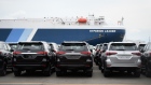 Toyota Motor Corp. Fortuner vehicles bound for shipment parked in front of a vehicle carrier ship at the Nagoya Port in Nagoya, Aichi Prefecture, Japan, on Monday, Aug. 23, 2021. The worsening chip shortage forced the world’s No. 1 automaker suspend output for several days at almost all its plants in Japan next month, forcing a 40% cut in production plans. Photographer: Akio Kon/Bloomberg