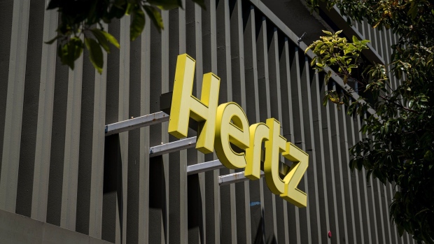 Signage is displayed outside a Hertz Global Holdings Inc. office in San Francisco, California, U.S., on Tuesday, May 5, 2020. Hertz Global Holdings said it entered into forbearances and limited waivers with certain of the Company's corporate lenders and holders of the company’s asset-backed vehicle debt. Photographer: David Paul Morris/Bloomberg