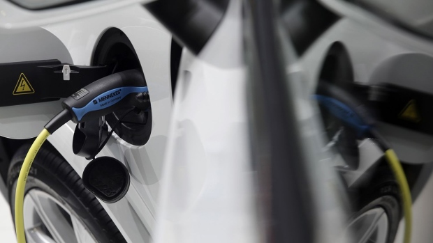 A charging plug in an electric automobile. Photographer: Matthew Lloyd/Bloomberg