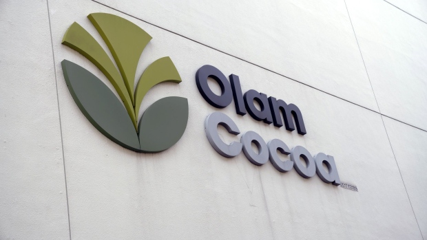 Olam Cocoa signage is displayed at an Olam International Ltd. cocoa factory in Singapore, on Monday, July 19, 2019. Asia’s cocoa industry is scouring for ways to boost local bean supplies as the region’s chocoholics munch through more candy than ever. Photographer: Wei Leng Tay/Bloomberg