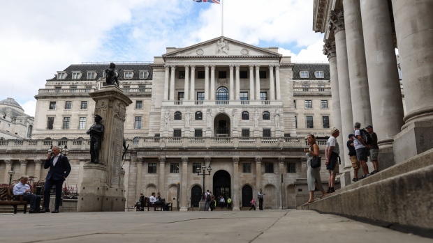 The Bank of England (BOE) in the City of London, U.K., on Thursday, Aug. 5, 2021. The Bank of England (BOE) may move a step closer to tightening monetary policy, unwinding 900 billion pounds ($1.2 trillion) government bond purchases while also opening the possibility that borrowing costs could be pushed below zero. Photographer: Hollie Adams/Bloomberg