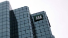 Signage is displayed outside the Manulife Financial Building in this photo taken with a tilt-shift lens in Ottawa, Ontario, Canada.