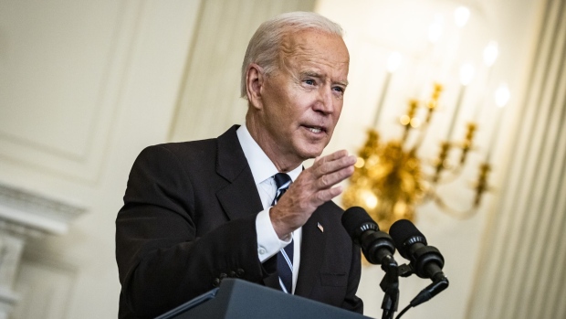 U.S. President Joe Biden speaks in the State Dining Room of the White House in Washington, D.C., U.S., on Thursday, Sept. 9, 2021. Biden will order all executive branch employees, federal contractors and millions of health-care workers to be vaccinated against the coronavirus, and direct his administration to issue new rules saying large private employers must require shots or testing.