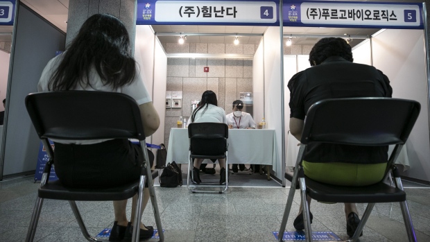 A job seeker participates in an interview at a job fair for youths organized by the Seongnam City government at Pangyo Techno Valley in Seongnam, South Korea, on Tuesday, July 6, 2021. South Korea came closer to recovering pre-pandemic employment as more people ventured out looking for jobs after the economy expanded at a faster pace than previously thought.