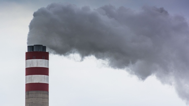 Emissions rise from a tower of the Eskom Holdings SOC Ltd. Kusile coal-fired power station in Mpumalanga, South Africa, on Monday, Dec. 23, 2019. The level of sulfur dioxide emissions in the Kriel area in Mpumalanga province only lags the Norilsk Nickel metal complex in the Russian town of Norilsk, the environmental group Greenpeace said in a statement, citing 2018 data from NASA satellites. Photographer: Waldo Swiegers/Bloomberg