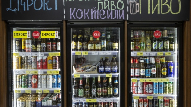 Beers and other alcoholic drinks sit on display in a refrigerator at a Krasnoe & Beloe liquor store in Moscow.