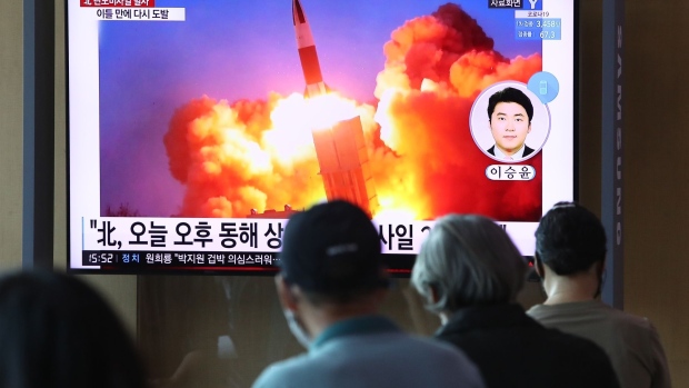 SEOUL, SOUTH KOREA - SEPTEMBER 15: People watch a TV at the Seoul Railway Station showing a file image of a North Korean missile launch, on September 15, 2021 in Seoul, South Korea. The unidentified type of missiles were fired from central inland areas of the North on Wednesday afternoon, and the South Korean and the U.S. intelligence authorities are analyzing details for additional information, the JCS said in a release. (Photo by Chung Sung-Jun/Getty Images) Photographer: Chung Sung-Jun/Getty Images AsiaPac