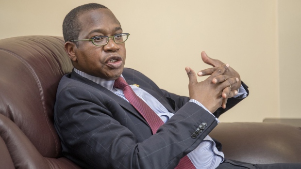 Mthuli Ncube, Zimbabwe's finance minister, speaks during an interview in Harare, Zimbabwe, on Thursday, Aug. 15, 2019. On the eve of major protests, which were called by the main opposition party over plunging living standards, Ncube said the country would establish a Monetary Policy Committee within a month that will cut interest rates, begin selling bonds with maturities of as long as 30 years, and proceed with a plan to privatize everything from state telecommunications companies to timber plantations.