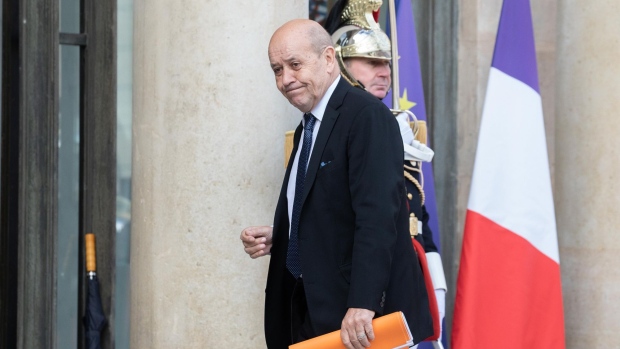 Jean-Yves Le Drian, France's foreign minister, arrives in the courtyard of Elysee Palace ahead of a meeting in Paris, France, on Tuesday, March 26, 2019. Airbus SE secured a $35 billion jet deal from China during a state visit by President Xi Jinping to the French capital, dealing a blow to Boeing Co. as it grapples with the grounding of its best-selling jet.
