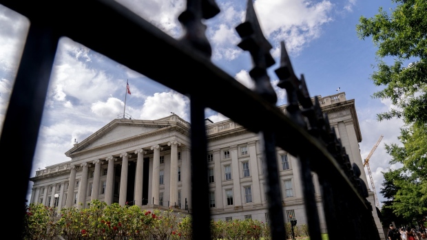 The U.S. Treasury Department building in Washington, D.C., U.S., on Saturday, June 26, 2021. The Federal Reserve might consider an interest-rate hike from near zero as soon as late 2022 as the labor market reaches full employment and inflation is at the central bank's goal.