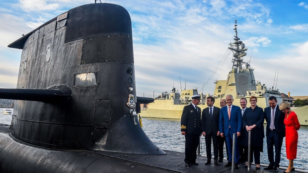 SYDNEY, AUSTRALIA - MAY 2: Australian Prime Minister Malcolm Turnbull (fourth left), President of France Emmanuel Macron (second left), Australian Minister for Defence Industry Christopher Pyne (centre left), Australian Minister for Defence Marise Payne (centre) and Australian Minister for Foreign Affairs Julie Bishop (right) are seen on the submarine HMAS Waller at Garden Island on May 2, 2018 In Sydney, Australia. Macron arrived in Australia on May 1 on a rare visit by a French president with the two sides expected to agree on greater cooperation in the Pacific to counter a rising China. (Photo by Brendan Esposito - Pool/Getty Images)