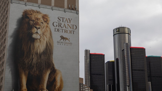 A billboard for MGM Grand Detroit hotel near the General Motors (GM) Renaissance Center in Detroit, Michigan, U.S., on Tuesday, Nov. 17, 2020. Michigan Governor Gretchen Whitmer announced Sunday refreshing restrictions — including suspending organized sports, halting in-person classes and closing restaurants and bars to indoor dining to combat spiking COVID-19 cases.