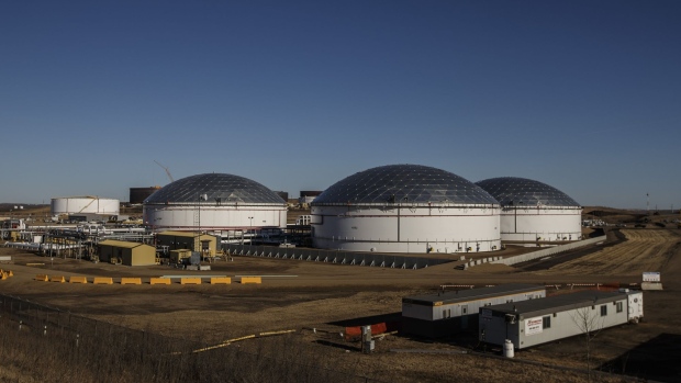 TC Energy Corp. oil storage tanks are seen in Hardisty, Alberta, Canada, on Tuesday, April 21, 2020. Since the start of the year, oil prices have plunged after the compounding impacts of the coronavirus and a breakdown in the original OPEC+ agreement. Photographer: Jason Franson/Bloomberg