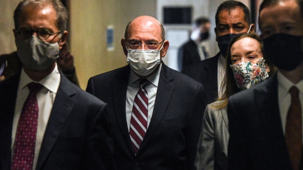 Allen Weisselberg, chief financial officer of Trump Organization Inc., center, walks towards the courtroom at criminal court in New York, U.S., on on Monday, Sept. 20, 2021. Getting Donald Trump's longtime chief financial officer to turn on his boss may prove tough, as Weisselberg's unlikely to get a lengthy sentence even if convicted on tax fraud and other charges.