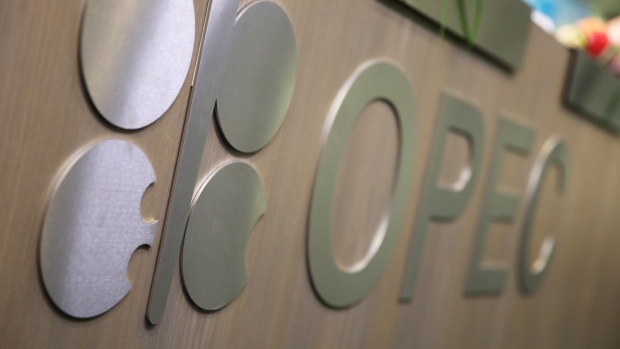 An OPEC flag stands on the front of a desk inside the OPEC Secretariat ahead of the 172nd Organization of Petroleum Exporting Countries (OPEC) meeting in Vienna.