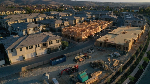 Townhomes under construction are seen in this aerial photograph taken over a Lennar Corp. development in San Diego, California, U.S., on Tuesday, Sept. 1, 2020. U.S. sales of previously owned homes surged by the most on record in July as lower mortgage rates continued to power a residential real estate market that’s proving a key source of strength for the economic recovery.