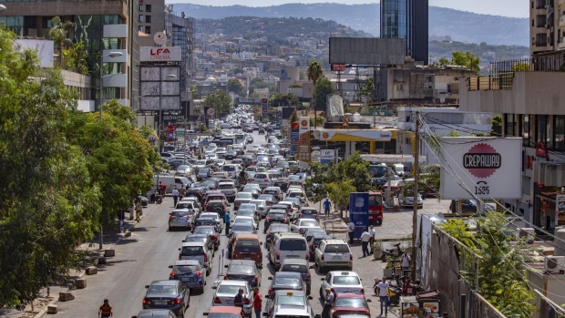 Automobiles queue at gasoline stations in the Furn el Chebbak district of Beirut, Lebanon, on Monday, Sept. 6, 2021. Egypt agreed to supply natural-gas to Lebanon through Jordan and Syria as the Arab states seek to help end power shortages in their crisis-ridden neighbor.