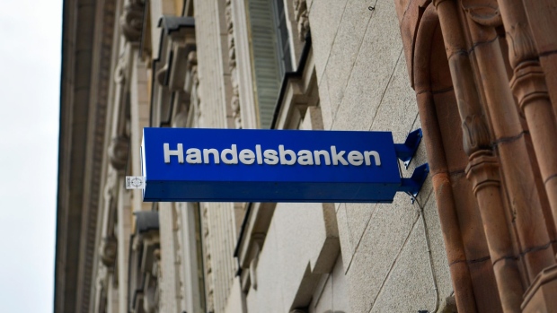 A sign sits on a Svenska Handelsbanken AB bank branch in Stockholm, Sweden, on Monday, Sept. 21, 2020. Finance Minister Magdalena Andersson said Sweden’s fiscal policy was entering a new phase as she presented a 2021 budget with $12 billion in extra spending and tax cuts to get the wheels of the coronavirus-struck economy turning again. Photographer: Mikael Sjoberg/Bloomberg