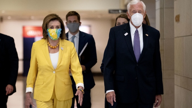 U.S. House Speaker Nancy Pelosi, a Democrat from California, left, and House Majority Leader Steny Hoyer, a Democrat from Maryland, depart from an all member House briefing on Afghanistan at the U.S. Capitol in Washington, D.C., on Aug. 24, 2021.