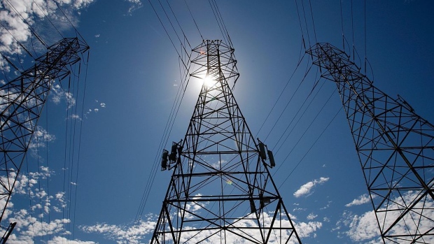 High voltage power lines in Pinole, California, U.S., on Thursday, June 17, 2021. California avoided blackouts Thursday evening, but grid officials warned that power supplies may be tight again on Friday as a triple-digit heat wave continues to grip the western U.S.