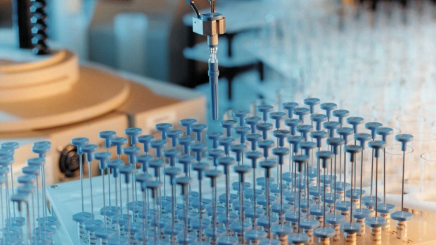 A robotic arm works above a tray of samples at an AstraZenenca Plc facility. AstraZeneca previously dropped further development of Lynparza, known chemically as olaparib, in 2011 after a clinical trial indicated it might not be sufficiently effective in a broad range of women with ovarian cancer.