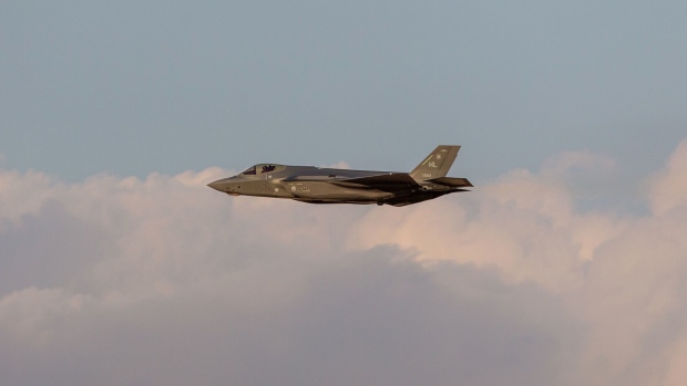 A Lockheed Martin Corp. F-35 fighter jet performs an air display on the first day of the 16th Dubai Air Show at Dubai World Central (DWC) in Dubai, United Arab Emirates, on Sunday, Nov. 17, 2019. The Dubai Air Show is the biggest aerospace event in the Middle East, Asia and Africa and runs Nov. 17 - 21. Photographer: Christopher Pike/Bloomberg