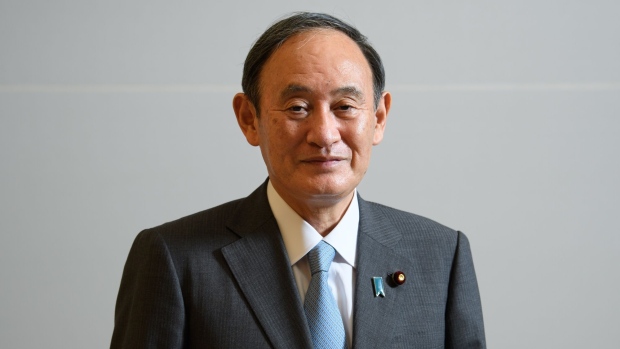 Yoshihide Suga, Japan's prime minister, following an interview in Tokyo, Japan, on Wednesday, Sept. 22, 2021. China's rapidly growing military influence and unilateral changing of the status quo could present a risk to Japan, Suga said ahead of the first Quad summit.