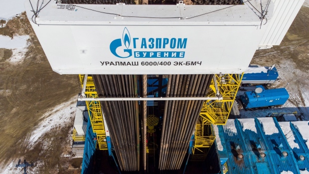 The Gazprom logo on the Gazprom PJSC gas drilling rig tower in the Kovyktinskoye gas field, part of the Power of Siberia gas pipeline project, near Irkutsk, Russia, on Wednesday, April 7, 2021. Built by Russian energy giant Gazprom PJSC, the pipeline runs about 3,000 kilometers (1,864 miles) from the Chayandinskoye and Kovyktinskoye gas fields in the coldest part of Siberia to Blagoveshchensk, near the Chinese border.