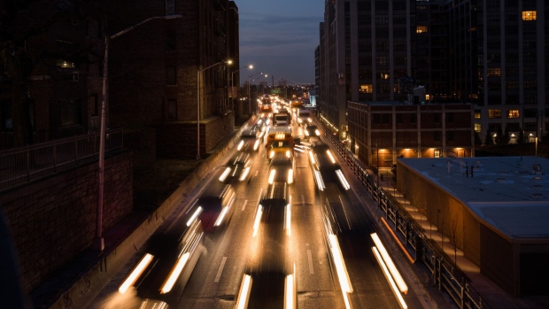 Light trails from moving traffic is seen along the Brooklyn Queens Expressway (BQE) in New York.
