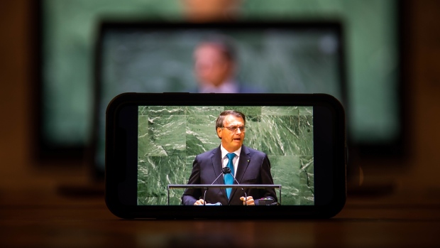 Jair Bolsonaro, Brazil's president, speaks during the United Nations General Assembly via live stream in New York, U.S., on Tuesday, Sept. 21, 2021. A scaled-back United Nations General Assembly returns to Manhattan after going completely virtual last year, but fears about a possible spike in Covid-19 cases are making people in the host city less enthusiastic about the annual diplomatic gathering.
