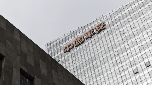 The Ping An Insurance Group Co. logo is displayed atop the Ping An International Financial Center (IFC) in Beijing, China, on Wednesday, Aug. 9 2017. Ping An Insurance Group is scheduled to release half year results on Aug. 17.