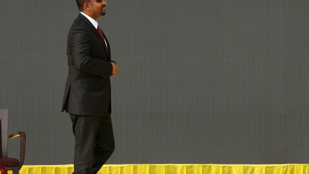 ADDIS ABABA, ETHIOPIA - OCTOBER 04: Prime Minister Abiy Ahmed takes the stage to deliver remarks at an inaugural celebration following Ahmed being sworn in for a second five year term as Prime Minister of Ethiopia on October 04, 2021 in Addis Ababa, Ethiopia. Mr Abiy's Prosperity Party was able to claim a majority after June's initial round of voting, although the country's election board postponed the vote in several dozen constituencies citing security and logistical concerns. Polls for dozens of those seats were held at the end of September, but there is no timeline for voting in several dozen remaining constituencies. (Photo by Jemal Countess/Getty Images) Photographer: Jemal Countess/Getty Images Europe