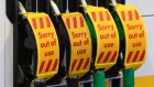 Covers on fuel pumps at a Royal Dutch Shell petrol station near Guildford, U.K., on Sept. 27. Photographer: Jason Alden/Bloomberg