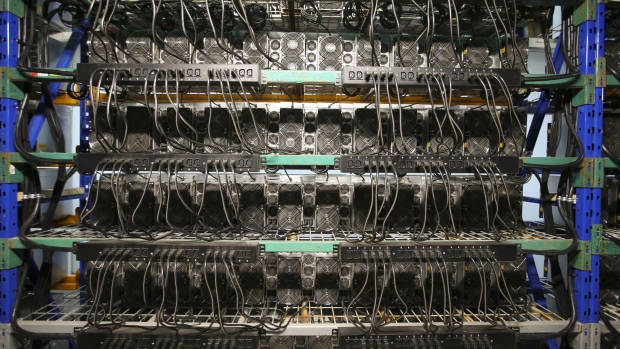 Cryptocurrency mining machines. Photographer: Christinne Muschi/Bloomberg
