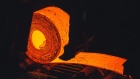 A heated and stretched steel slab is coiled at the NLMK Pennsylvania plant in Farrell, Pennsylvania, U.S., on Thursday, Sept. 19, 2019. U.S. raw steel production rose to 1.48 million tons from 1.446 million tons a week earlier, the American Iron and Steel Institute said in an email. Photographer: Allison Farrand/Bloomberg