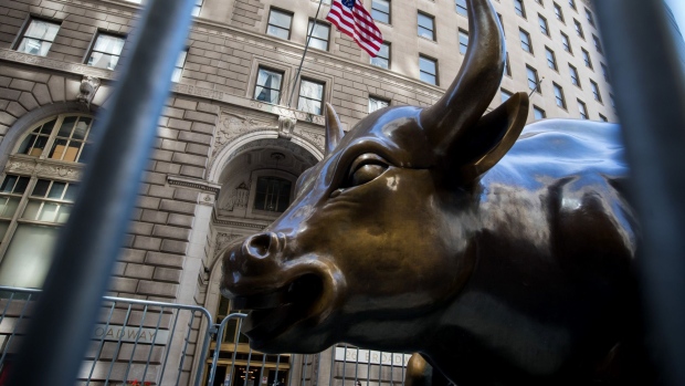 The Charging Bull statue stands near the New York Stock Exchange. Photographer: Michael Nagle/Bloomberg