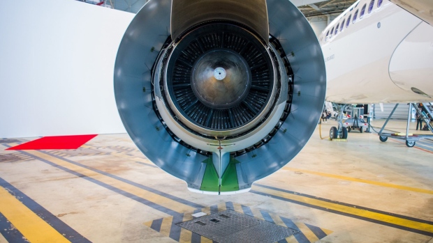 An engine on a new Airbus SE A220 narrow-body passenger jet during its unveiling by Air-France-KLM at Paris Charles de Gaulle airport in Paris, France, on Wednesday, Sept. 29, 2021. The A220s will replace 51 Airbus A318s and A319s with an average age close to 17 years that operate a significant chunk of Air France’s intra-European operations. Photographer: Nathan Laine/Bloomberg