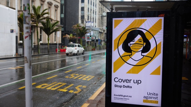 A Covid-19 poster at a bus stop in the central business district in Auckland, New Zealand, on Thursday, Sept. 16, 2021. New Zealand’s economy was expanding at more than twice the pace forecast by economists before a nationwide lockdown interrupted its momentum, latest data show.