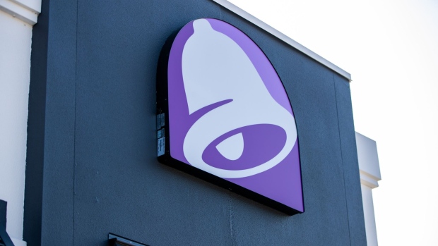 Signage is displayed at a Yum! Brands Inc. Taco Bell restaurant in Quincy, Massachusetts, U.S., on Thursday, July 25, 2019. Yum! Brands is scheduled to release earnings figures on August 1.