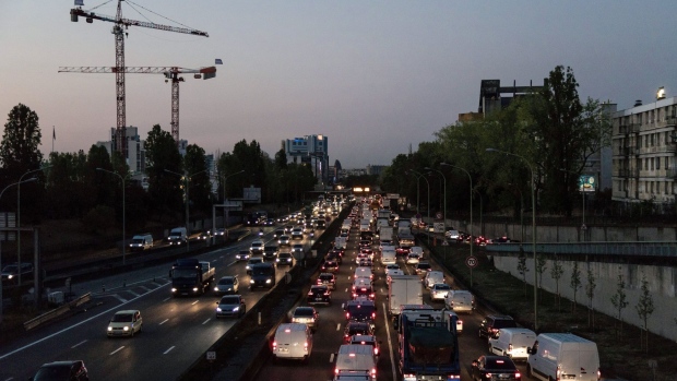 Trucks and automobiles stand in a morning rush hour traffic jam at Porte de Bagnolet, in Paris, France, on Monday, Sept. 14, 2020. The European Union’s executive will unveil an ambitious emissions-cut plan this week that’ll leave no sector of the economy untouched, forcing wholesale lifestyle changes and stricter standards for industries.
