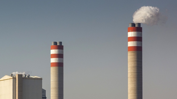 Emissions rise from the Eskom Holdings SOC Ltd. Kusile coal-fired power station near Witbank in Mpumalanga, South Africa, on Wednesday, June 12, 2019. Air pollution in the biggest towns in Mpumalanga is regularly higher than that in Beijing and Jakarta, two of the most polluted cities in the world, according to AirVisual, an air-quality monitoring app. Photographer: Waldo Swiegers/Bloomberg