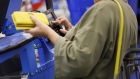 A customer uses a credit card terminal to complete a purchase at a Wal-Mart Stores Inc. location in Burbank, California, U.S., on Thursday, Nov. 16, 2017. Black Friday, the day after Thanksgiving, marks the traditional start to the U.S. holiday shopping season. Photographer: Patrick T. Fallon/Bloomberg