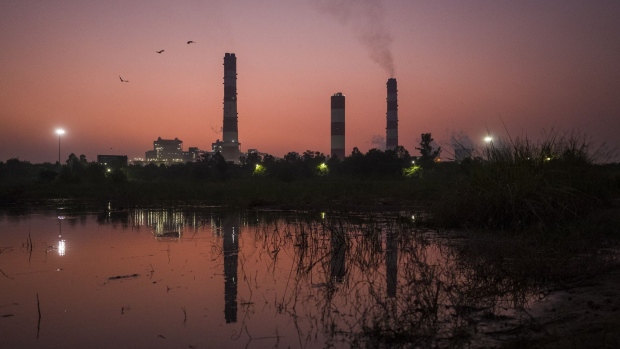 The coal-fired NTPC Ltd. Dadri Power Plant in Gautam Budh Nagar district, Uttar Pradesh, India, on Thursday, Oct. 7, 2021. India, which relies on coal for about 70% of electricity generation, has already seen signs of power shortages, and needs to lift deliveries to avert the risk of blackouts. Photographer: Anindito Mukherjee/Bloomberg