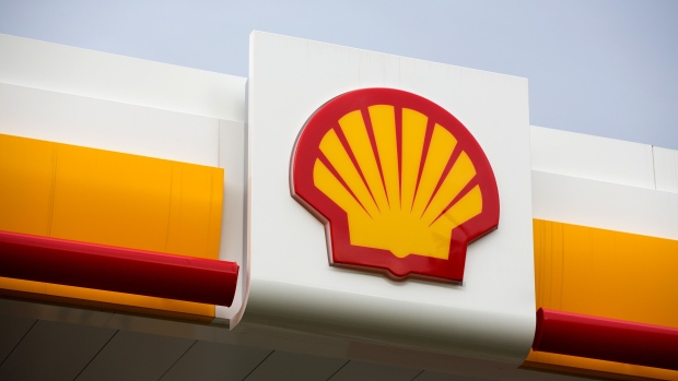A scallop shaped Shell logo sits on display above a newly opened gas station, operated by Royal Dutch Shell Plc, in Kemerovo, Russia, on Friday, Sept. 14, 2018. Royal Dutch Shell plans to double the number of its petrol stations in Russia to 450, says Sergey Starodubtsev, the director-general of Shell Neft, the company's Russian subsidiary.